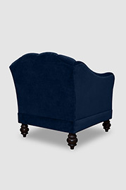 Carla channel-tufted armchair in Como Indigo blue velvet