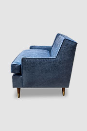 Ladybird sofa in Caprieze Denim Style blue leather with bench cushion and taper legs with sabots
