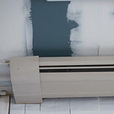 CertaPro worked to smooth the uneven walls before unifying the colors.
