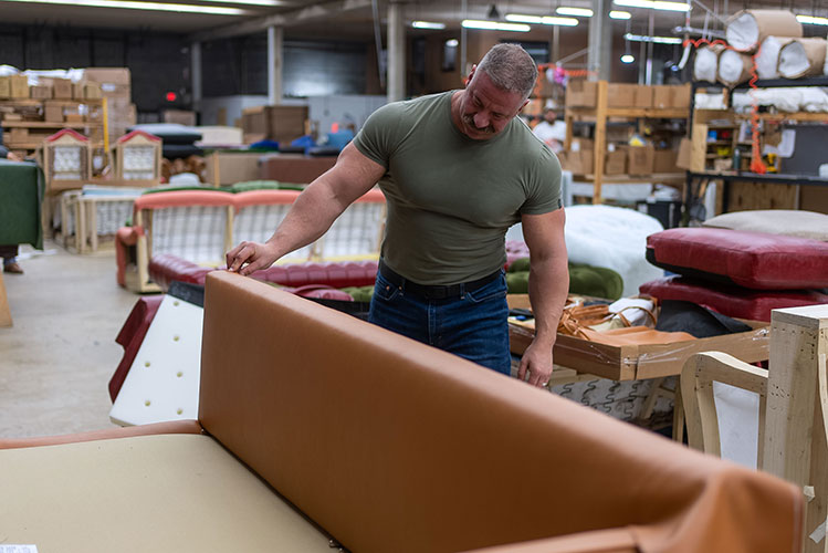 Chris Stout-Hazard working in factory
